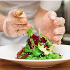 Chef preparing a salad