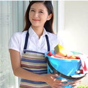 Housekeeping staff with cleaning supplies